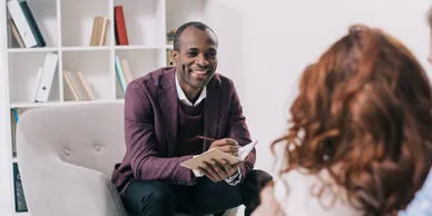 Man giving counseling to a woman